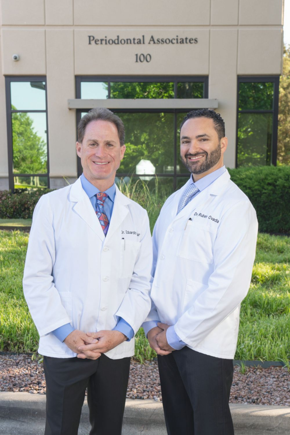 Dr. Tanur & Ovadia outside their dental office